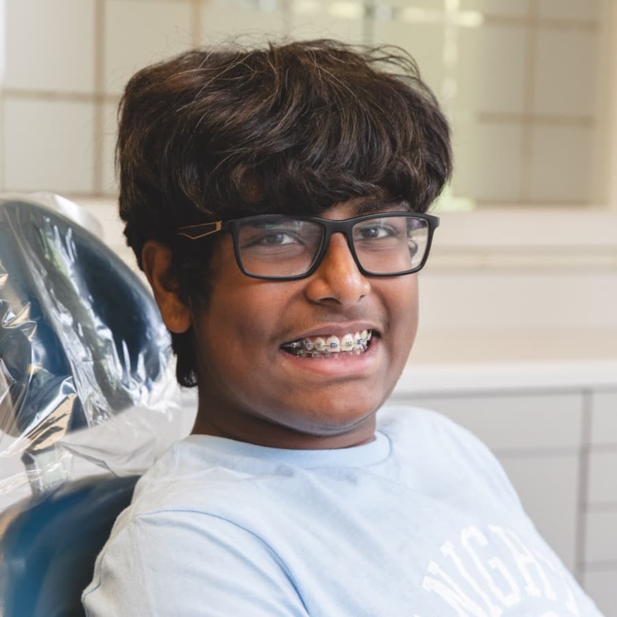 image of teen with braces