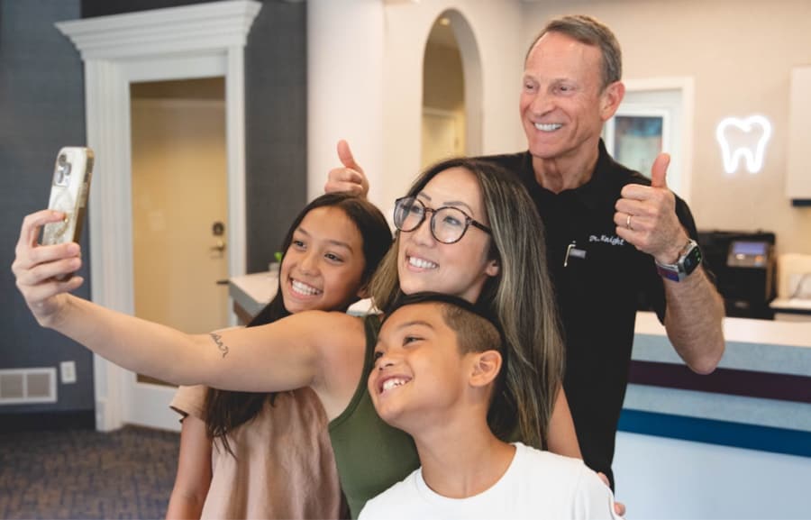 family taking selfie at visit