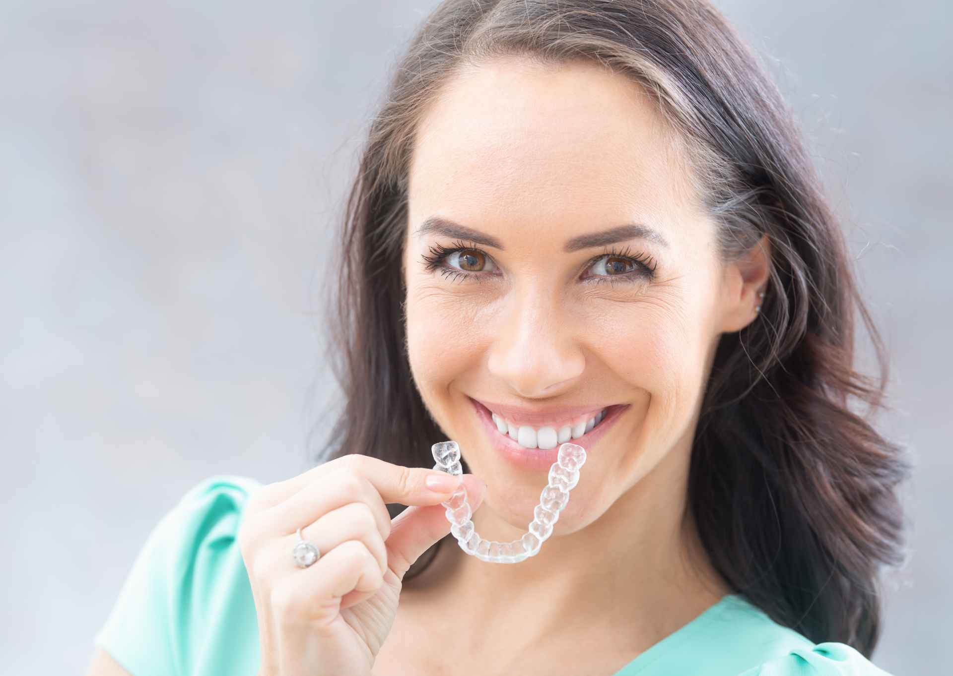 Woman with Invisalign Aligner